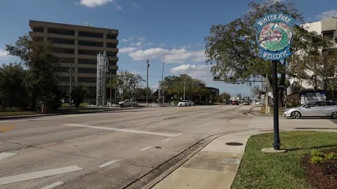 Static shot of road with winter park fl welcome sign Video stock 238040002