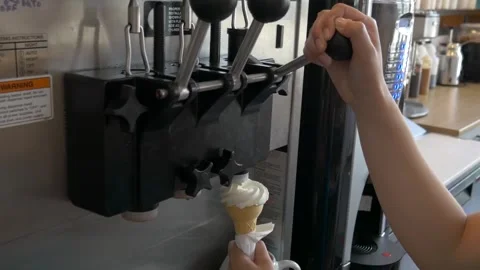 Static shot Serving a soft serve vanilla ice cream cone Summer Vacation Vídeo Stock 295548004