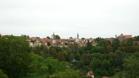 Static shot showing cityscape with medieval towers in Rothenburg,Germany. Video stock 139568771