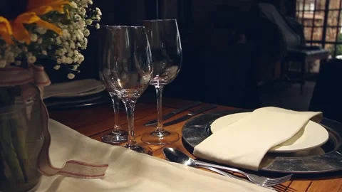Static shot of silver and white place setting with glasses Stock Footage 160829383