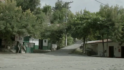 Static shot of small town street corner in Colombia Stock Footage 153811491