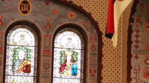 Static Shot of Stained Glass Window and Ornate Wall Sconces in Synagogue Stock-Footage 330369778