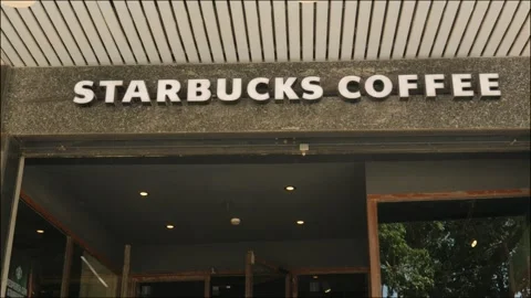 Static Shot of Starbucks Coffee Storefront Sign Stock Footage 341324820