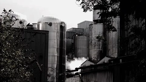 Static shot of steam escaping from huge metal vats Video stock 160212005