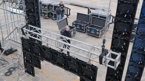 Static shot of the technical preparation of the stage of an outdoor event Stock Footage 123405285