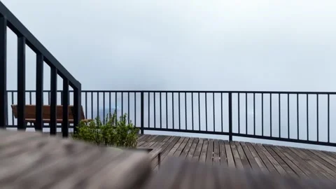 Static Shot of Thick Mist Passing Over Modern Terrace, Atmospheric Fog Stock Footage 338405009