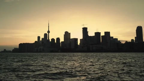 Static shot of Toronto skyline silhouette sunset golden hour Stock Footage 204738582