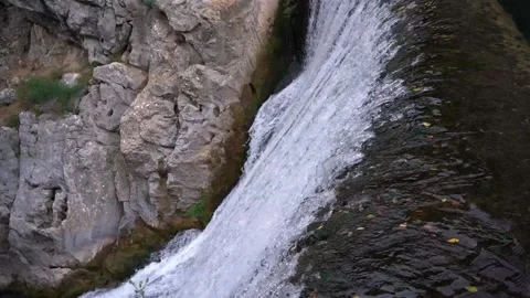 Static shot with tripod of Waterfall top view flowing Stock Footage 136476788