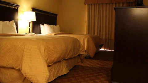 Static shot of two hotel beds Vidéo 24756655