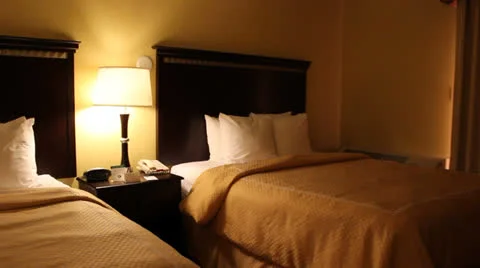 Static shot of two hotel beds Stock Footage 24756751