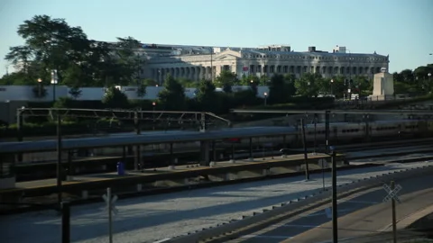 Static shot of two trains crossing into a Chicago station, Illinois, USA Stock Footage 202904763