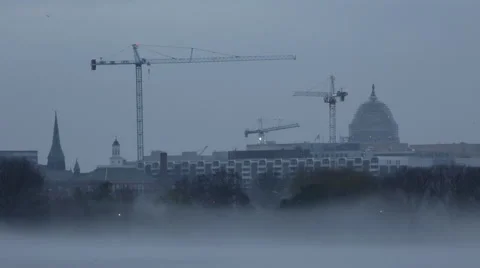 Static shot of the U.S. Capitol and Potomac river fog in Washington D.C. Stock Footage 61303656