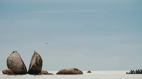 Static shot of Waka approaching large rock Stock Footage 107924500