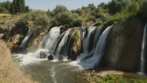 Static shot of water flowing over the Muradiye Waterfall, Van, Turkey Stock Footage 104613952