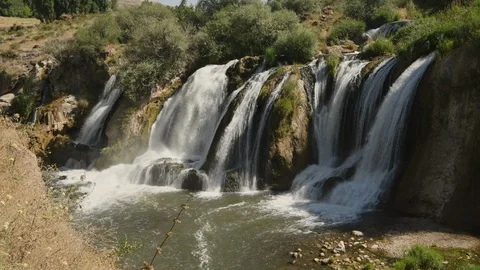 Static shot of water flowing over the Muradiye Waterfall, Van, Turkey Stock Footage 104614813
