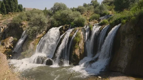 Static shot of water flowing over the Muradiye Waterfall, Van, Turkey Stock Footage 104617085