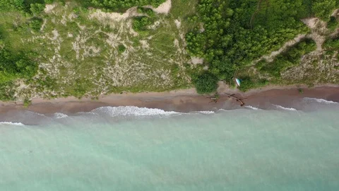 Static shot of waves crashing ashore beach on Lake Huron from above Stock Footage 125039029