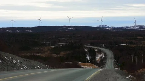 A static shot of Windmills overlooking the drive known as The Irish Loop, NL. Stock Footage 61526369