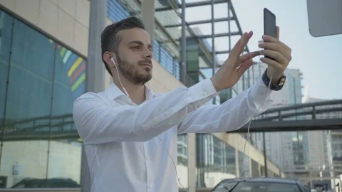 Static side view of positive Caucasian man having video chat Stock Footage 97923887