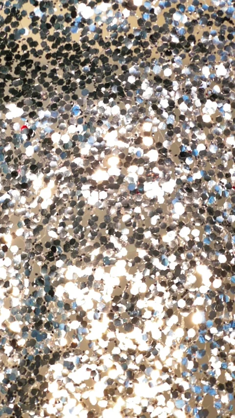 Static silver sequin background sparkling under moving light rays for festi.. Stock Footage 340034619