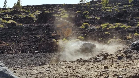 Static slow-motion shot of rock crashing and exploding into pieces Stock Footage 142769169
