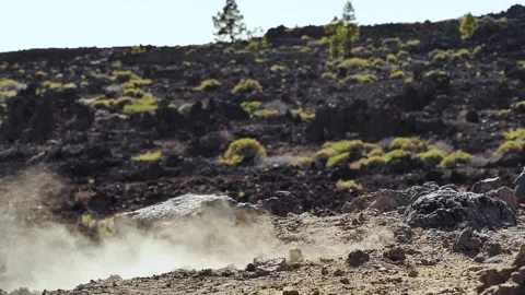 Static slow-motion shot of rock crashing and exploding into pieces Video stock 142772467