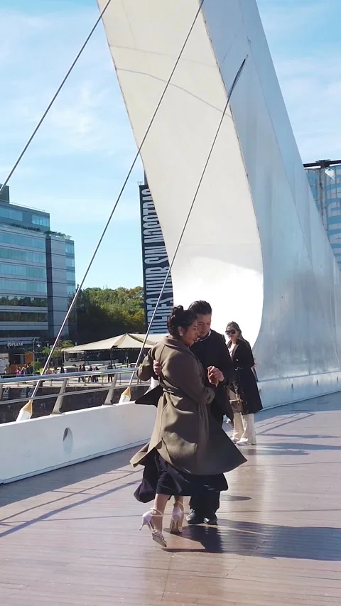 Static Slow Motion Tango Couple Dancing at Puente de la Mujer in Puerto Madero Video stock 336782870