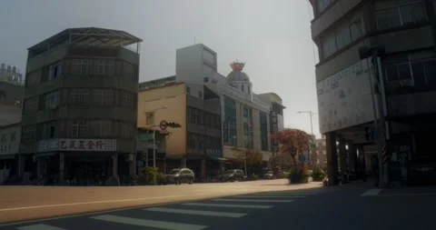 Static Suburb Road With Light Traffic Under Warm Summer Sunlight Stock Footage 230915102
