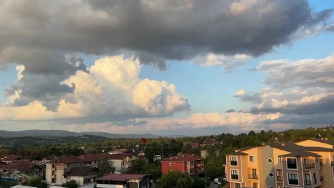 Static Sunset View Over Derbent Neighborhood with Dramatic Summer Clouds Stock Footage 344559707