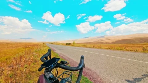 Static time-lapse bicycle on side of road with beautiful panorama views outdo Stock Footage 163025016