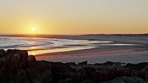 Static time lapse of sunset over beach and ocean waves Stock Footage 346383242