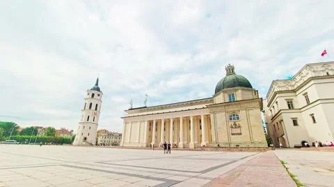 Static timelapse Vilnius cathedral square tourist site with tourist walking a Stock-Footage 157886160