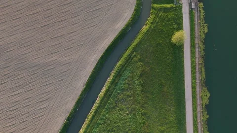 Static top-down view of Canale Milano Cremona beside irrigation canal and Video stock 340387415