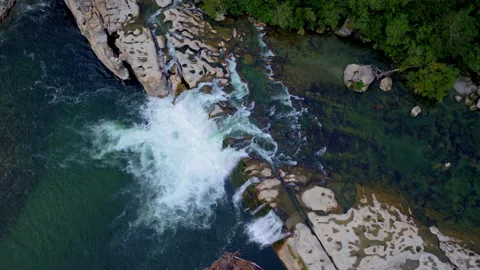 Static top shot of a dramatic waterfall Stock Footage 155465291