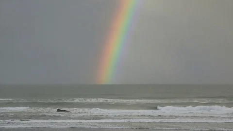 Static very wide shot of a rainbow over the pacific ocean oregon united state Video stock 74095808