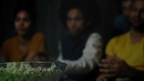 Static video of popcorn on the table during social gathering Stock Footage 131919952