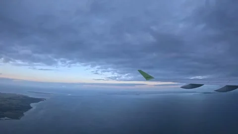 Static view of airBaltic flight over Danish coastline and Baltic Sea at twilight Vidéo 340183755