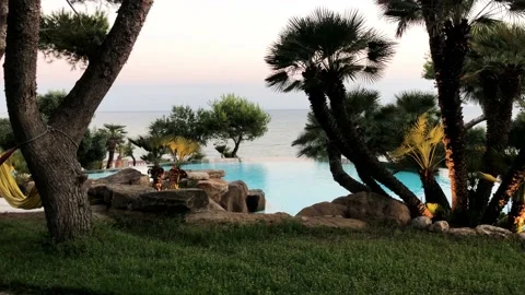 Static view of an amazing garden in Spain. View of an infinity pool in a Stock Footage 140950468