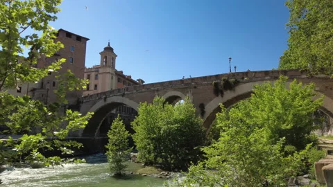 A static view of the ancient Roman Ponte Fabricio at the Isola Tiberina Stock Footage 154116871
