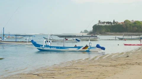 Static view on boat on beach in front of temple Video stock 165843225