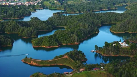 Static View of Boat Navigating Guatape Reservoir Islands Stock Footage 345046477