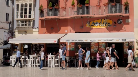 Static view of a busy pedestrian square in old historical European city Stock Footage 117744894