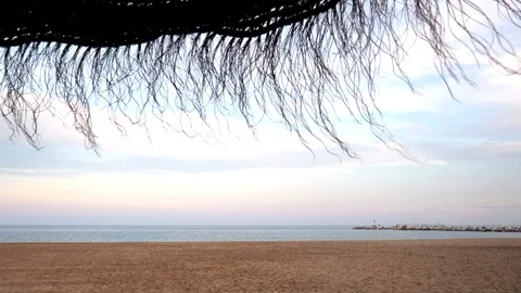 Static view of an empty sandy beach. Nice cloudy dramatic sky. Stock Footage 118852830