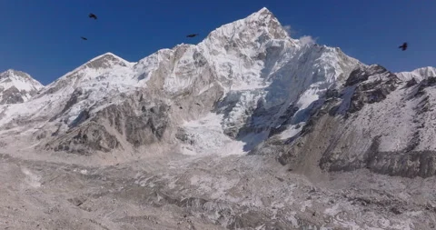 Static view of Gorakshep, Khumbu Region, Nepal featuring Himalayan crows flying Stock Footage 337399560