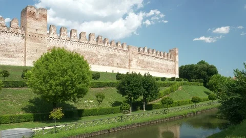 Static view of a medieval walled town and his moat Stock Footage 96583995