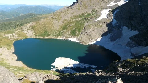 Static view to mountain lake with floe. Altai Stock Footage 103374400