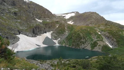 Static view to mountain lake with glacier. Altai Stock Footage 103377122