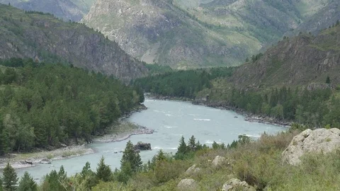 Static view from a mountain to a rapid river Katun. Altai. Small motion 動画素材 84576307