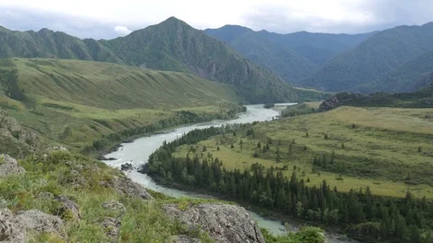 Static view from a mountain to a rapid river Katun. Altai 動画素材 84583646