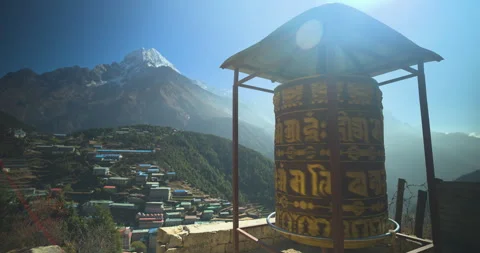 Static view of Namche Bazaar Nepal showing large spinning prayer wheel above Stockbeeldmateriaal 337395525